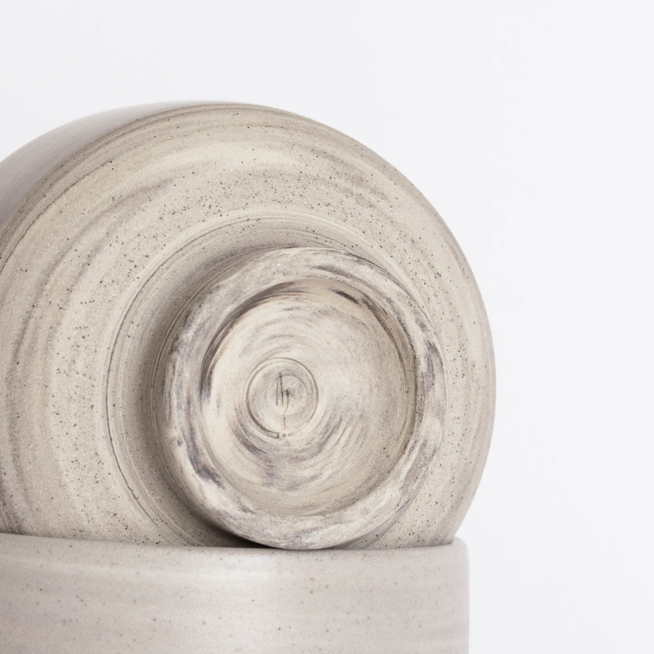 Close-up of the foot and maker’s mark on a handmade ice cream bowl.